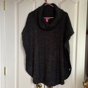 Woman within short sleeve sweater